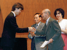 Mr. Suganuma with Dr. Suzuki at his graduation recital in 1987